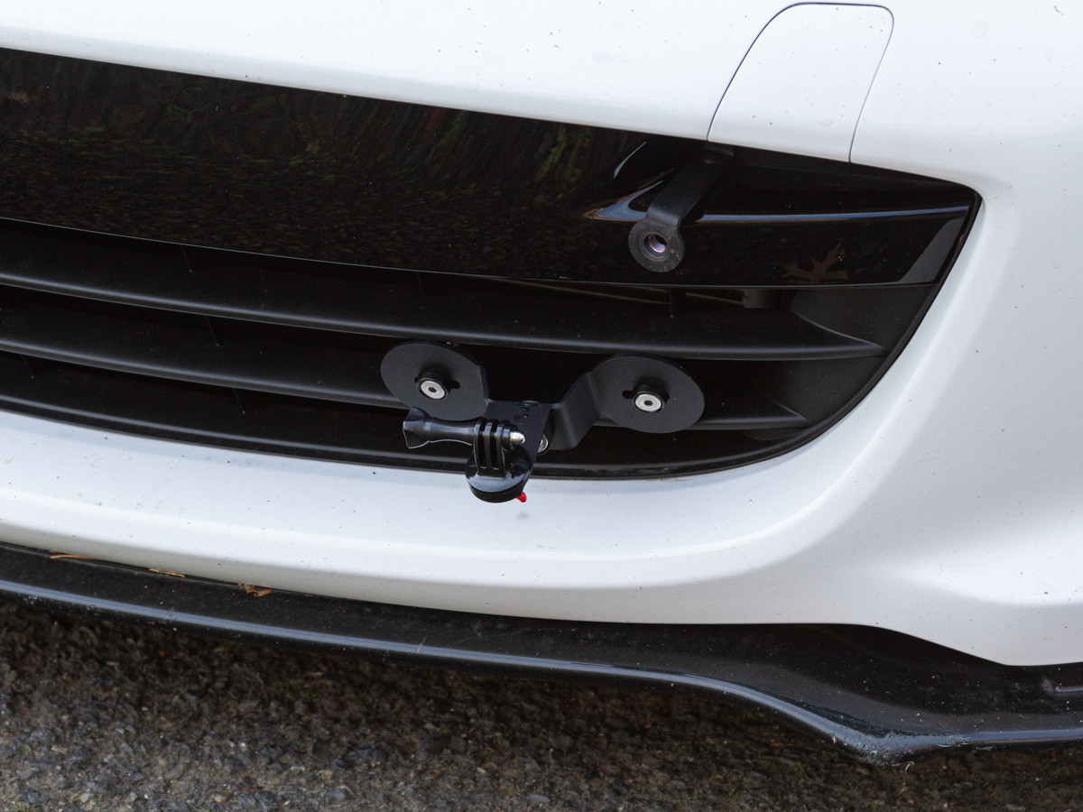 The CravenSpeed Action Cam Grille Mount installed on a white 2016 Mazda Miata ND