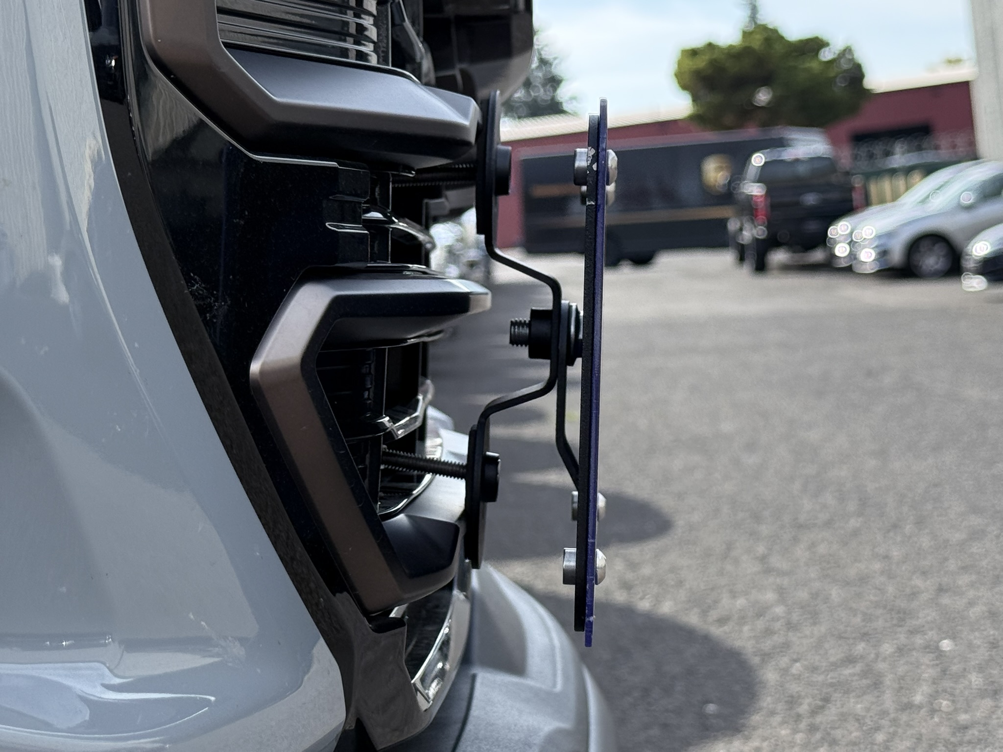 The Platypus License Plate Mount for GMC Sierra 1500 5th gen 2019 to 2025 AT4/AT4X