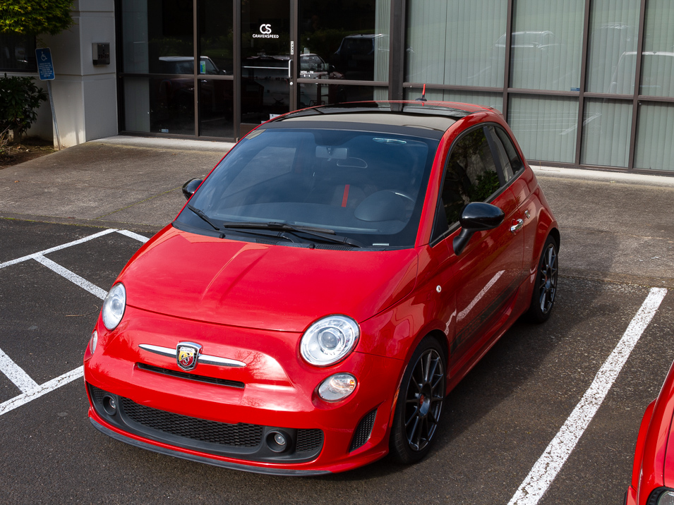 A Fiat 500 Abarth with the CravenSpeed roof trim protector installed.