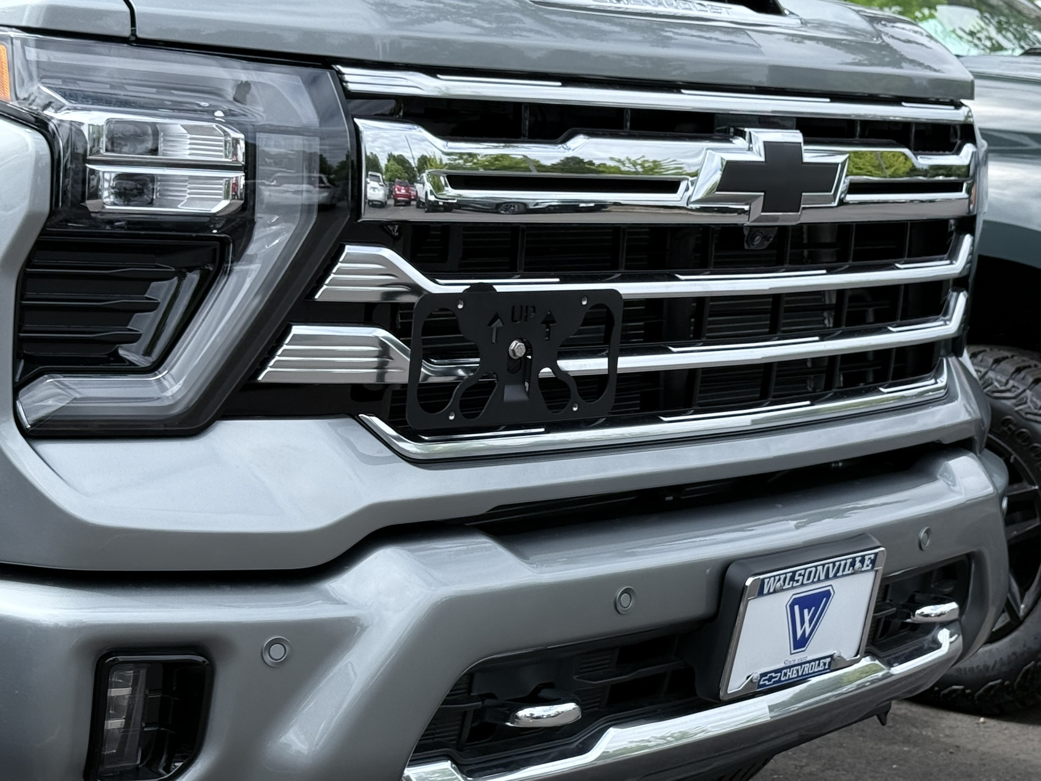 The Platypus License Plate Mount installed on a 2025 Chevrolet Silverado HD High Country. 