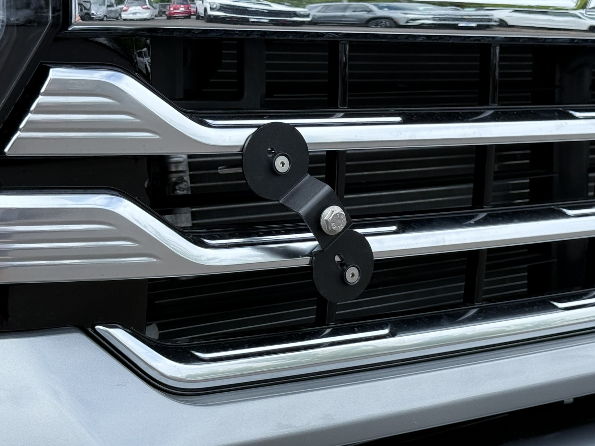 The Platypus License Plate Mount installed on a 2025 Chevrolet Silverado HD High Country. 