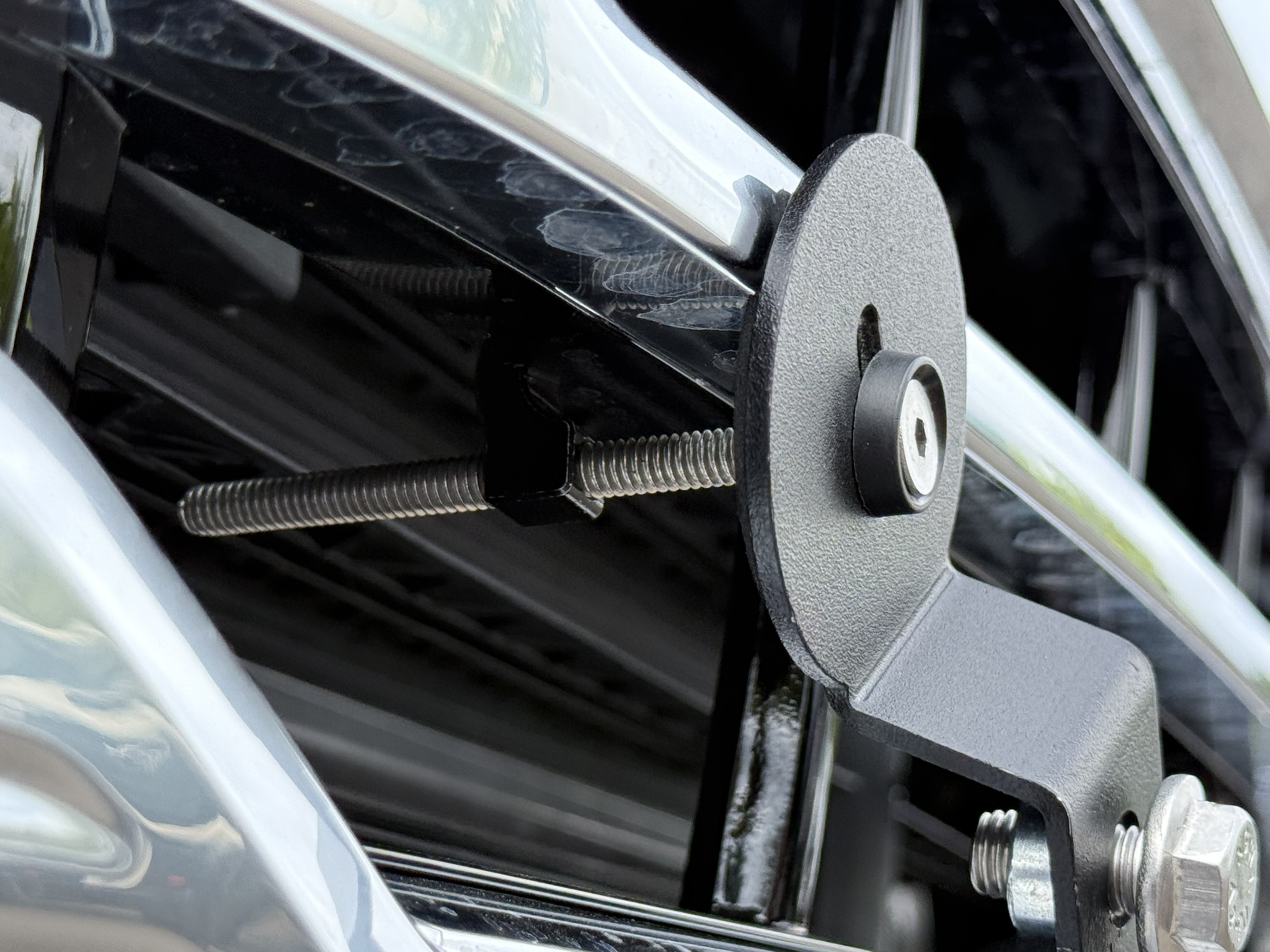 The Platypus License Plate Mount installed on a 2025 Chevrolet Silverado HD High Country. 