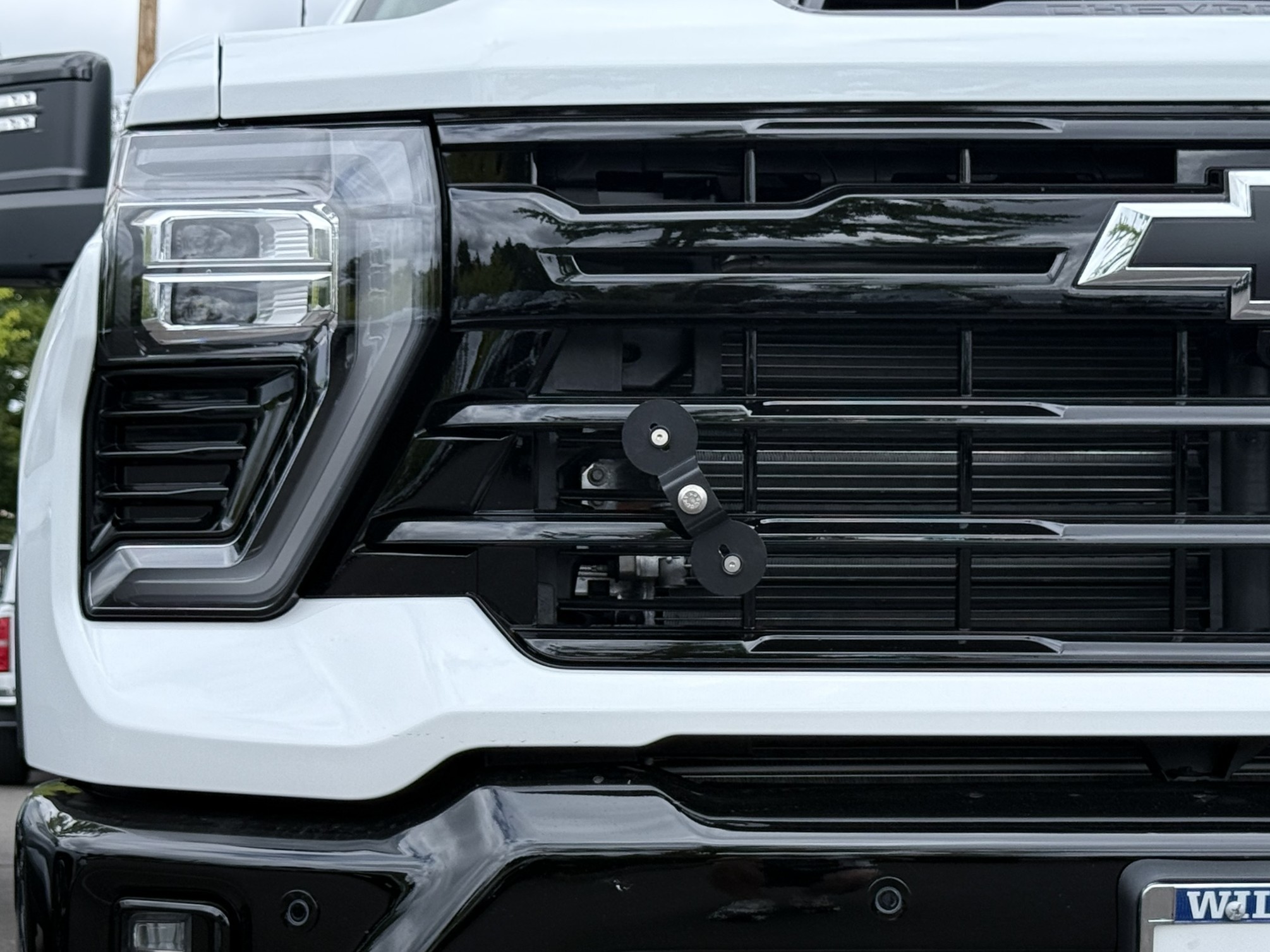 The Platypus License Plate Mount installed on a 2025 Chevrolet Silverado HD LT with the Z71 Off-Road Package