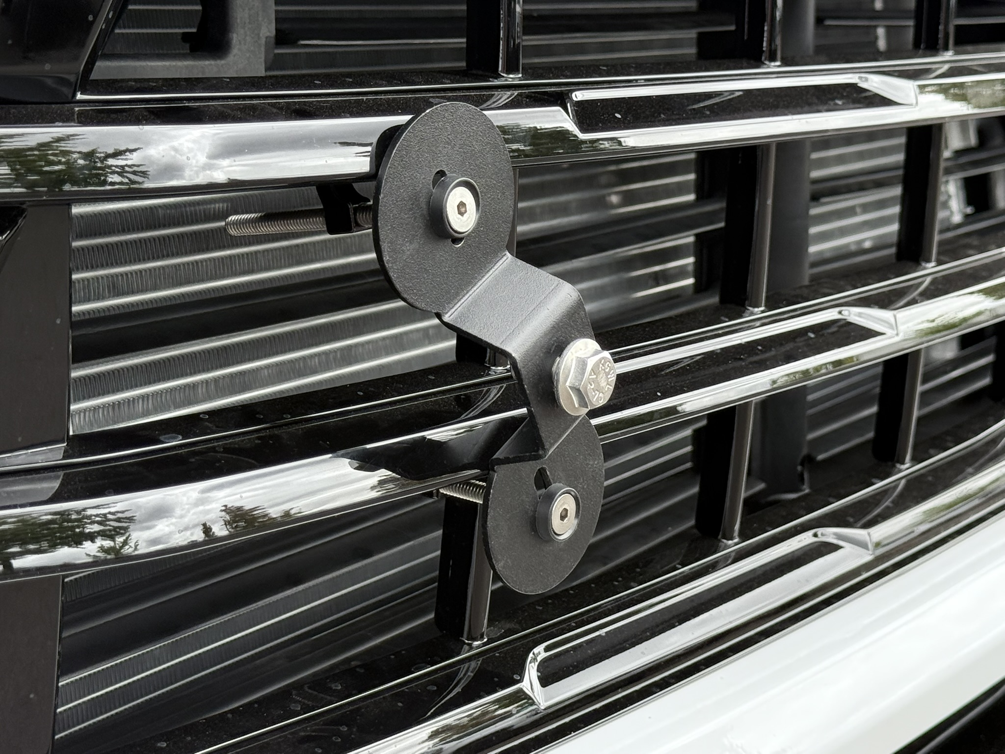 The Platypus License Plate Mount installed on a 2025 Chevrolet Silverado HD LT with the Z71 Off-Road Package