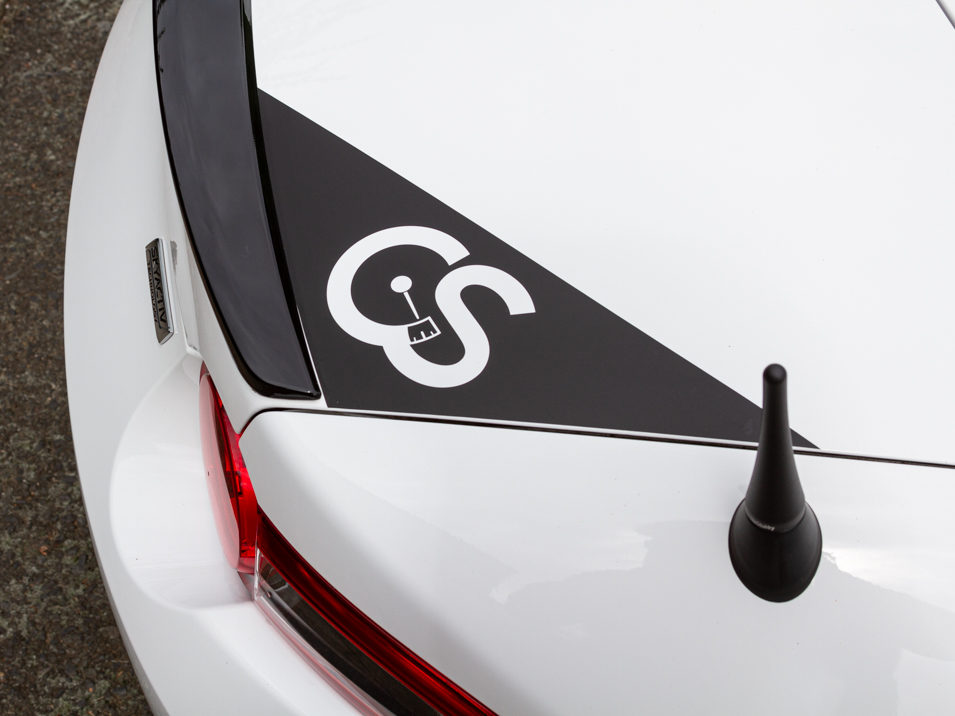 The CravenSpeed Graphics Kit and CravenSpeed Stubby Antenna installed on a white 2016 ND Miata.