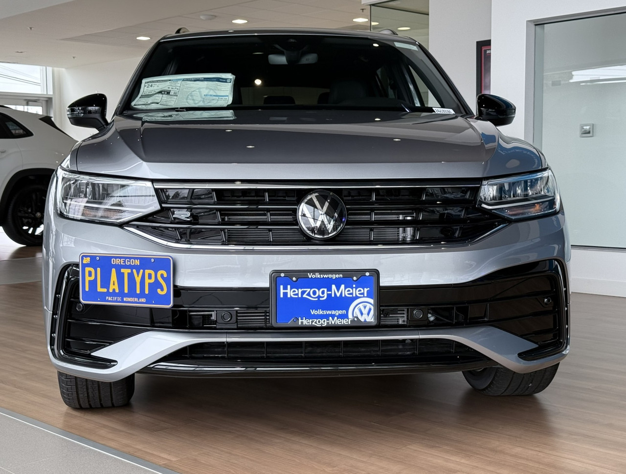 https://cdn11.bigcommerce.com/s-351ed/images/stencil/{:size}/products/7357/285960/the_platypus_license_plate_mount_for_volkswagen_tiguan_2nd_gen_2018_to_2024_P0999BQ_7357__92366.1753372580.jpg?c=2