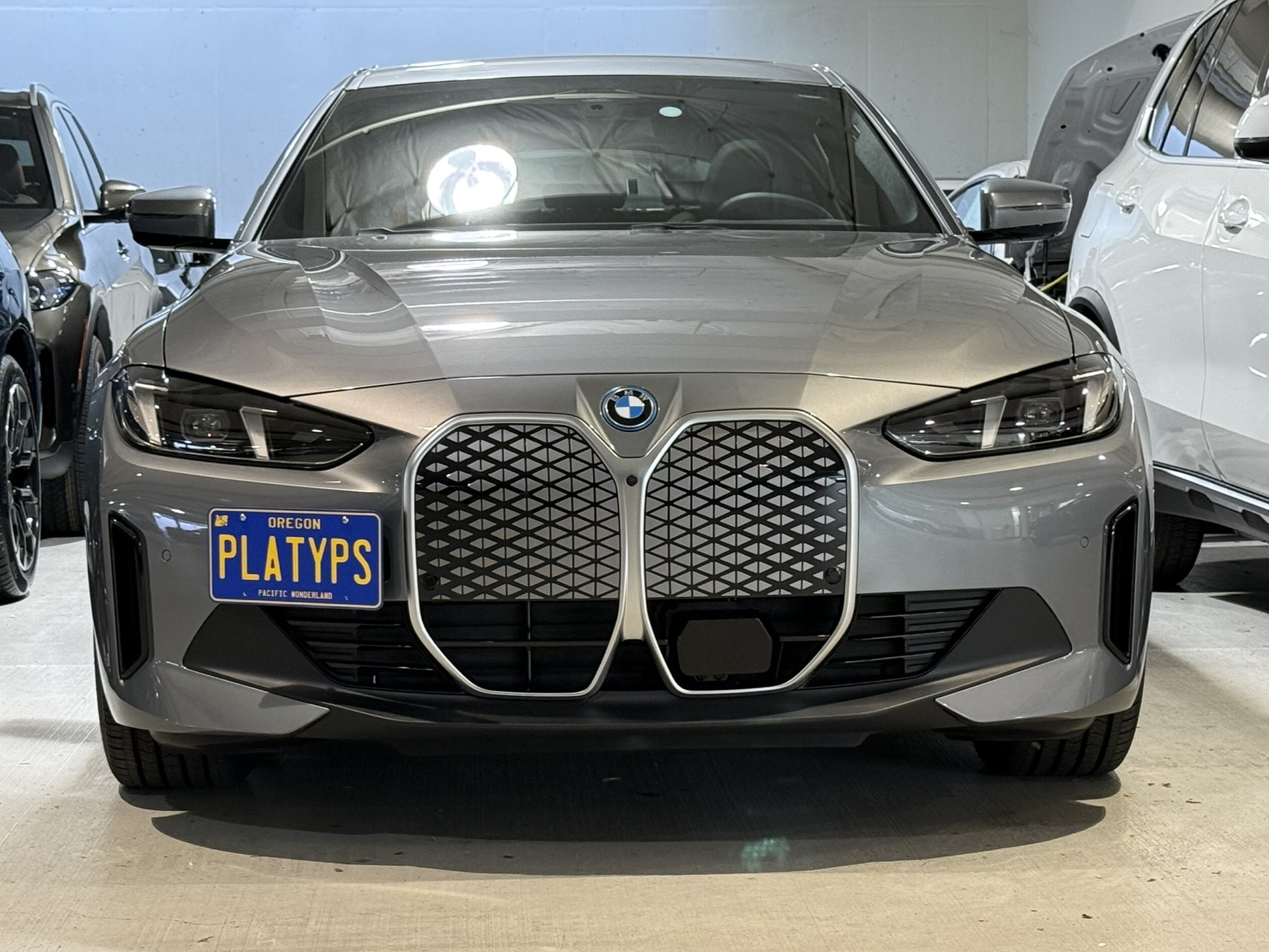 The Platypus License Plate Mount shown on a 2025 BMW i4 eDrive40