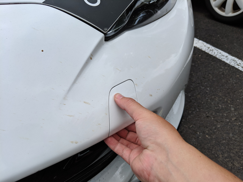 removing the towing eye cover