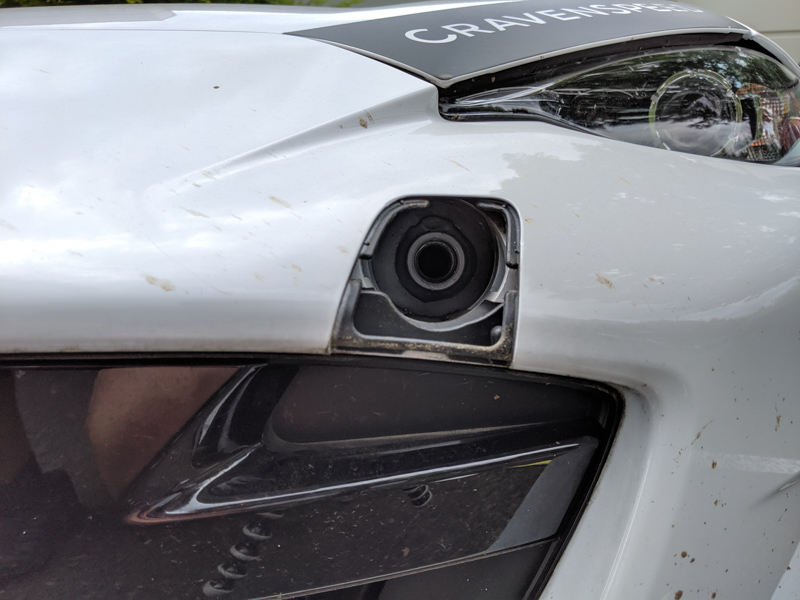 removing the towing eye cover