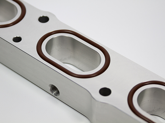 Close up of The Koala Intake Manifold Spacer