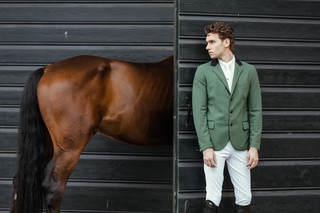 A man modeling a riding helmet