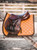 PS of Sweden Jump Saddle Pad - Brown Suede
Anatomically shaped saddle pad with a suede binding and vegan leather seam, and the iconic PS quote along the spine. Our saddle pads have extra space at the whithers, and our unique stop-cushions that keep the saddle pad in place under the saddle. Underside is Quick-Dry material that transports moisture and is anti-bacterial, and the surface is dirt-repellent.