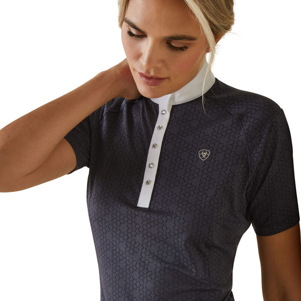 All polished and ready to perform, the Showstopper keeps you cool and dry – plus features an odour-resistant finish. Performance fabric features jacquard construction – the pattern is woven into the fabric to beautiful effect. Rhinestone buttons add just the right touch of showy shine.

- Moisture Movement Technology™ wicks moisture away from the skin
- ClimateTEK smart technology regulates the body’s temperature whatever the weather
- Fabric finish inhibits the growth of bacterial odours
- Poplin show collar
- Extended rhinestone button placket
- 90%Polyester
- 10%Spandex