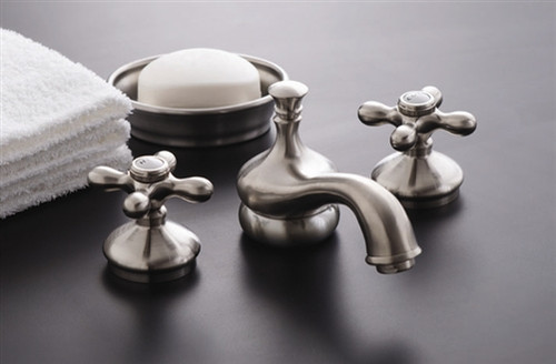 Strom Plumbing P0140M - Sacramento Matte Nickel Widespread Lavatory Faucet with Metal Cross Handles and Pop-Up Drain. The metal cross handles have a porcelain button for hot and cold.