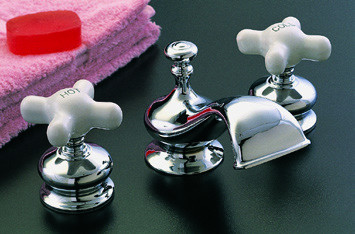 Strom Plumbing - P0377C Thames Polished Chrome Plated Widespread Lavatory Faucet with Traditional Spout, Porcelain Cross Handles and Pop-Up Drain. Cross handles have porcelain button for hot and cold.