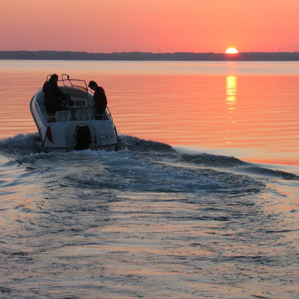 Boating as sun sets