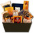 Gift basket featuring an assortment of chocolates, sweet and salty snacks, and dried fruit Gift basket featuring an assortment of chocolates, sweet and salty snacks, and dried fruit