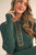 COLLIER SWEATER
