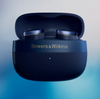B&W Pi8 Wireless Earbuds in midnight blue in smart charing case