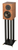 Revival Audio Atalante 3 Bookshelf Speakers in walnut, angled, and on stands

