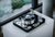 ProJect Signature 12.2 Turntable, flywheel, on white bench