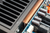 Canor AI 1.20 Integrated Solid-State Amplifier in Black. Image shows heat dispersal system