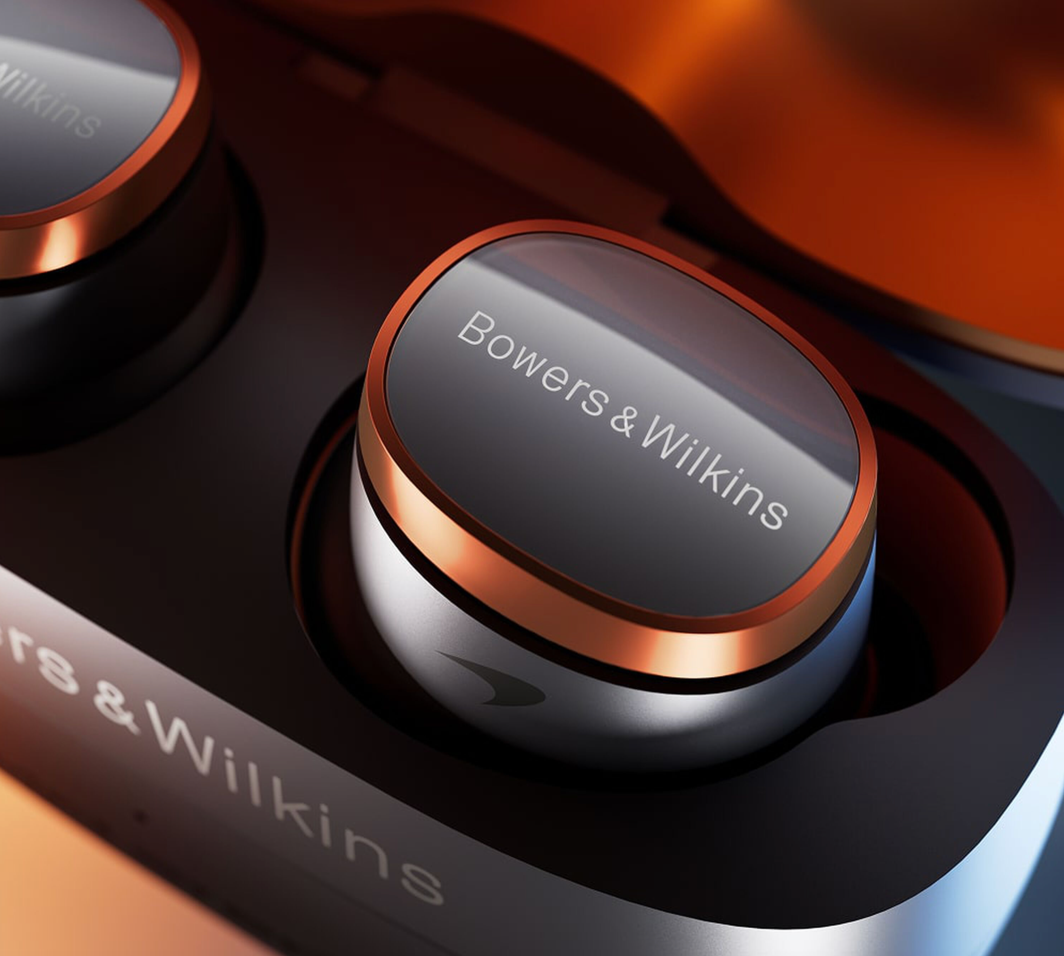 b-w-pi8-wireless-earbuds-mclaren-edition-case-close-up-hero-stereophonic.png.png b-w-pi8-wireless-earbuds-mclaren-edition-case-close-up-hero-stereophonic.png.png