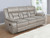 Greer Upholstered Tufted Back Motion Sofa Taupe
