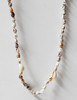 Close up of one Sea shell Lei with Cowrie shells
