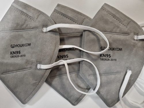 A display of multiple gray Powecom KN95 masks spread out to show the quantity in a pack.