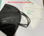 A flat lay of a black Powecom KN95 mask, showcasing its foldable, portable design.