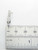 Monkey eating a banana sterling silver charm .925 Monkies Monkeys side view