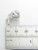 Skull with dagger in mouth sterling silver charm .925 Skulls charms side view