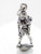 Outdoor Girl with hand on knife sterling silver charm .925 Survival side view
