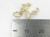 Stork holding a baby 9ct gold charm .375 babys storks babies charms side view