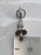 Pixie sitting on a mushroom sterling silver charm .925 charms side view
