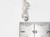 Kitten playing with a ball sterling silver charm .925 Kittens playful side view