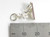 Mouse sitting on trap eating cheese sterling silver charm .925 Mice side view
