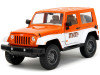 2007 Jeep Wrangler Orange Metallic and White and Orange M&M Diecast Figure "M&M's" "Hollywood Rides" Series 1/24 Diecast Model Car by Jada