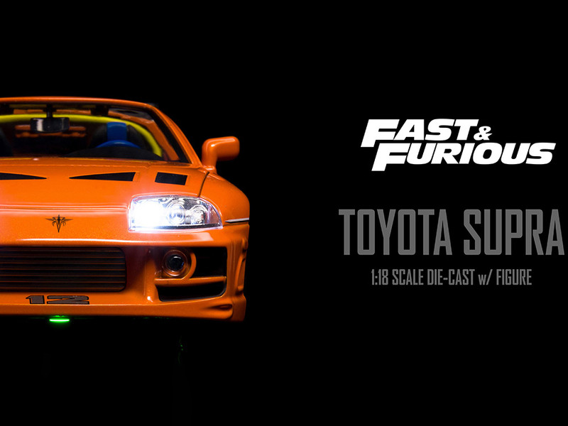 1995 Toyota Supra Orange Metallic with Lights and Brian Figurine