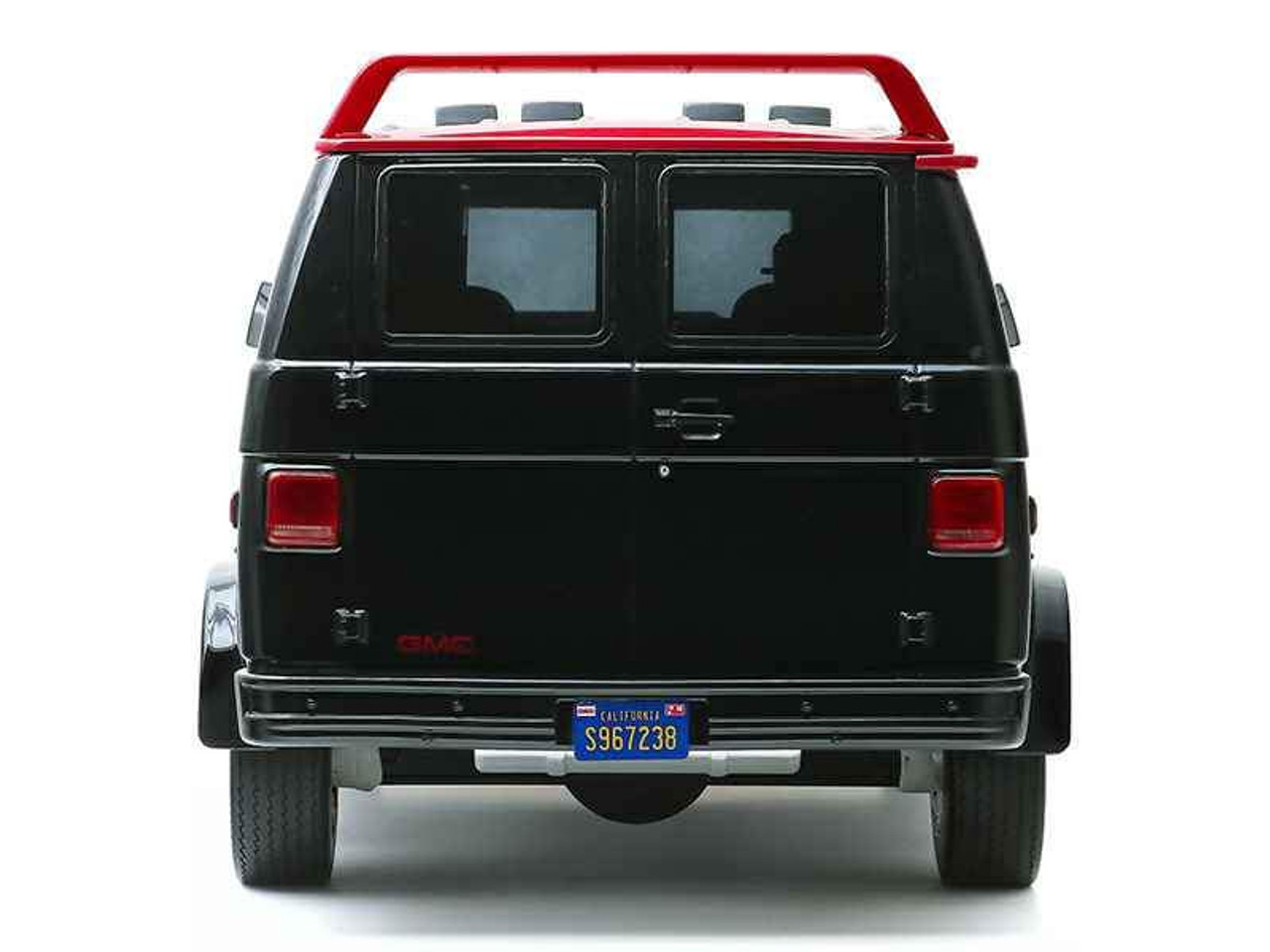 1983 GMC Vandura Van Black and Silver with Red Stripe 