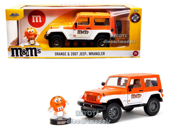 2007 Jeep Wrangler Orange Metallic and White and Orange M&M Diecast Figure "M&M's" "Hollywood Rides" Series 1/24 Diecast Model Car by Jada