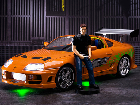 1995 Toyota Supra Orange Metallic with Lights and Brian Figurine "Fast & Furious" Movie 1/18 Diecast Model Car by Jada