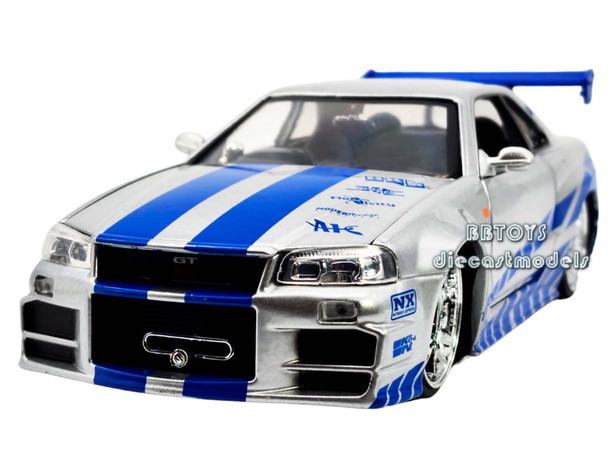 Brian's Nissan GTR Skyline R34 RHD (Right Hand Drive) Silver with Blue Stripes "Fast & Furious" 1/24 Diecast Model Car by Jada