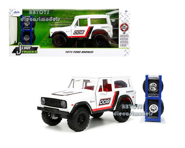 1973 Jeep Wrangler White/Red/Black  with Graphics and Extra Wheels "Just Trucks" Series 1/24 Diecast Model Car by Jada