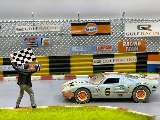 1965 Ford GT40 #6 Light Blue with Orange Stripe (Race Worn Version) "Gulf Oil" with Flag Man Figure1/64 Diecast Model Car by Auto World
