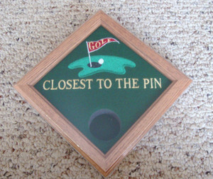 This "Closest to the Pin" award display box will showcase your tournament ball in a fantastic setting. Commemorate your tournament logo or sponsors and the players achievement in one award. This "Closest to the Pin" award display box will showcase your tournament ball in a fantastic setting. Commemorate your tournament logo or sponsors and the players achievement in one award.