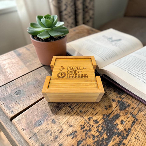 This set includes 4 coasters and 1 coaster holder.