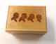 This personalized hinged-box is designed to hold a variety of items such as candy.