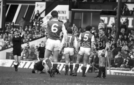 Gordon Rae 22657205-Hibs Gordon Rae no 5 argues with Hearts Mike Galloway as the ...